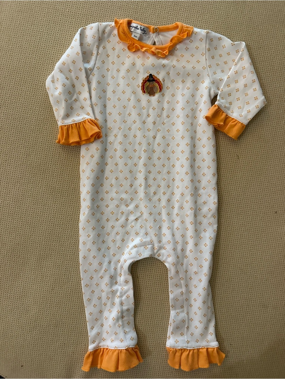 Infant White Footie with Orange Ruffle Trim